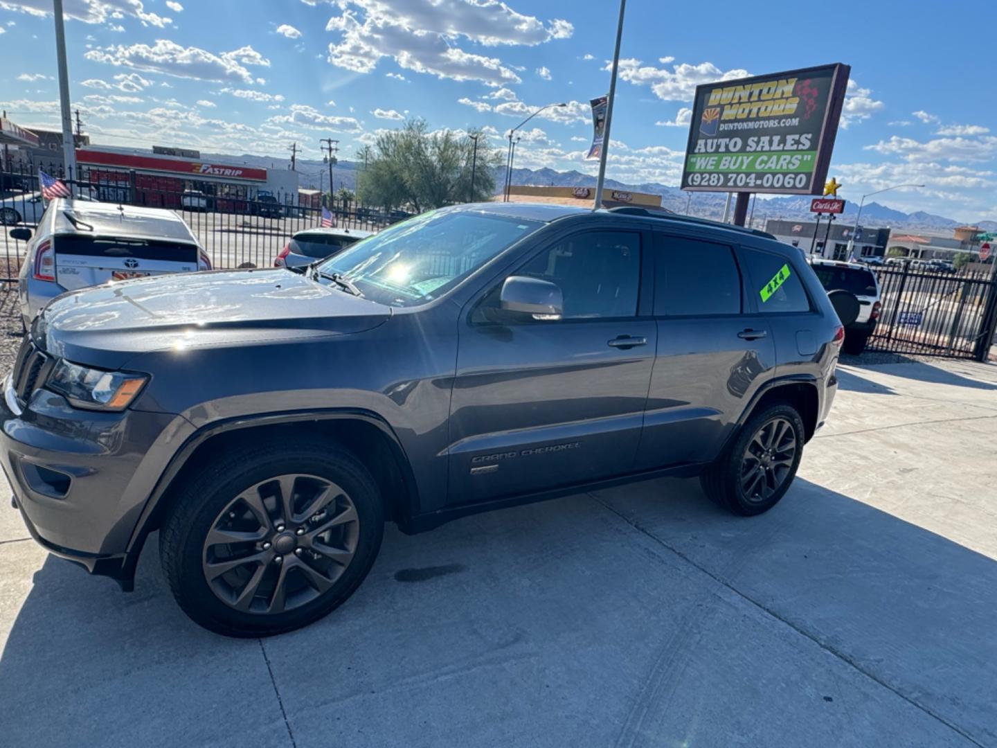 2016 grey Jeep Grand Cherokee (1C4RJFBG0GC) , located at 2190 Hwy 95, Bullhead City, AZ, 86442, (928) 704-0060, 0.000000, 0.000000 - 75th anniversary edition. clean carfax. jeep grand cherokee limited 4 wd. Leather loaded. 81k miles. free and clear title. - Photo#7